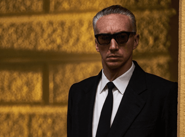 Enzo Ferrari (Adam Driver) in "Ferrari." (Neon)