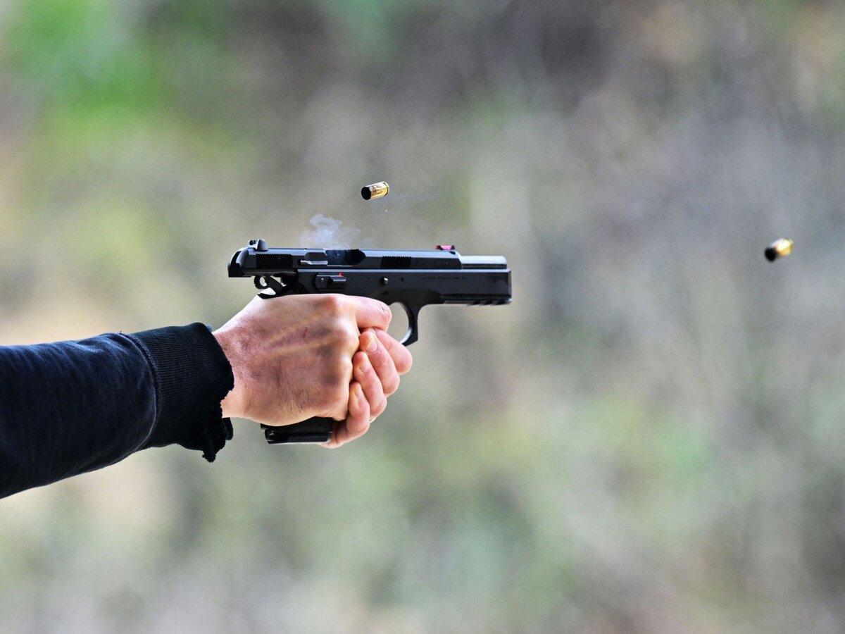 A man fires a pistol during a pistol self-defense class at Burro Canyon Shooting Park in Azusa, Calif., on Feb. 12, 2023. (Frederic J. Brown/AFP via Getty Images)