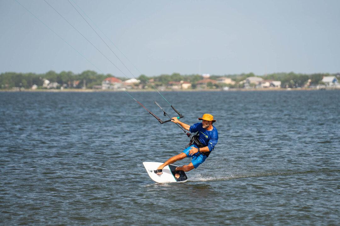 The shore is a popular spot for fishing, spotting wildlife, and water sports like kite surfing. (Courtesy of Santa Rosa County Tourist Development Office; Carlos Carreno/Moment/Getty Images; Courtesy of Santa Rosa County Tourist Development Office)