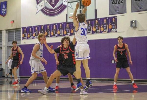 Dana Hills High School junior guard Collin Haugh (30) shoots the ball in a recent basketball game. (Courtesy of Dana Hills High School)