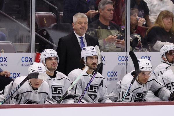 Head coach Todd McLellan of the Los Angeles Kings watches from the bench during the second period of the NHL game at Mullett Arena in Tempe, Ariz., on Nov. 20, 2023. (Christian Petersen/Getty Images)