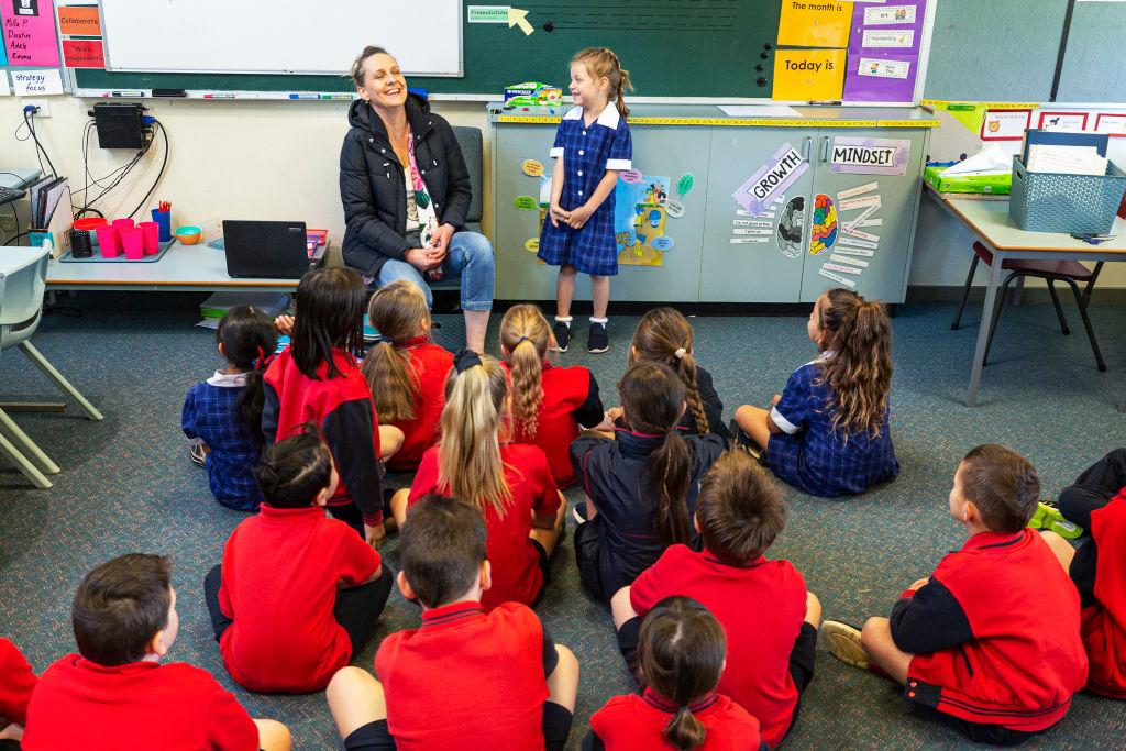 Grade one students enjoy returning to the classroom at Lysterfield Primary School on October 12, 2020 in Melbourne, Australia. (Photo by Daniel Pockett/Getty Images)