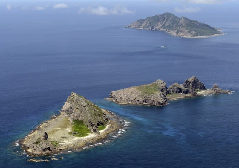 A group of disputed islands, Uotsuri island (top), Minamikojima (bottom), and Kitakojima, known as Senkaku in Japan and Diaoyu in China, in the East China Sea in September 2012. (Kyodo/Reuters)