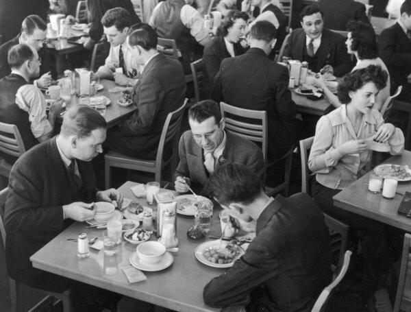 Ford workers eating in the Willow Run bomber plant cafeteria during their lunch period, circa 1950s. (FPG/Getty Images)