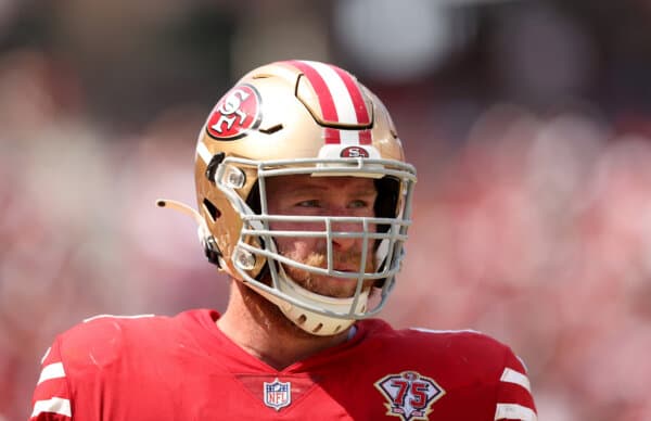 Jake Brendel (64) of the San Francisco 49ers stands on the sideline during their preseason game against the Las Vegas Raiders at Levi's Stadium in Santa Clara, Calif., on August 29, 2021. (Ezra Shaw/Getty Images)