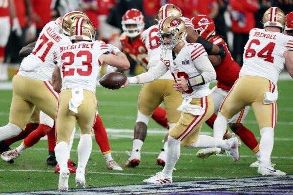 Brock Purdy (13) of the San Francisco 49ers hands the ball to Christian McCaffrey (23) in the second quarter of the Super Bowl in Las Vegas on Feb. 11, 2024. (Harry How/Getty Images)