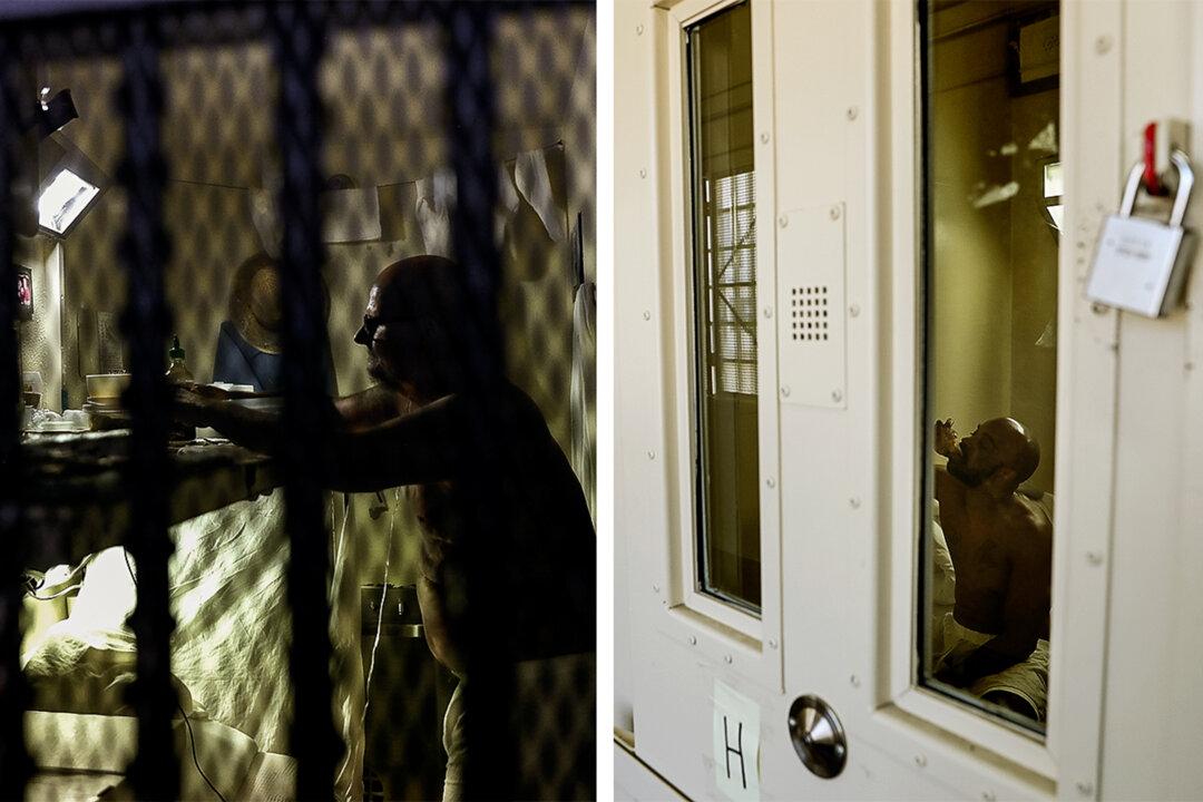 (Left) An inmate sits in his cell at San Quentin State Prison's death row in San Quentin, Calif., on Aug. 15, 2016. (Right) A condemned inmate eats in his cell at San Quentin State Prison's death row adjustment center on Aug. 15, 2016. (Justin Sullivan/Getty Images)
