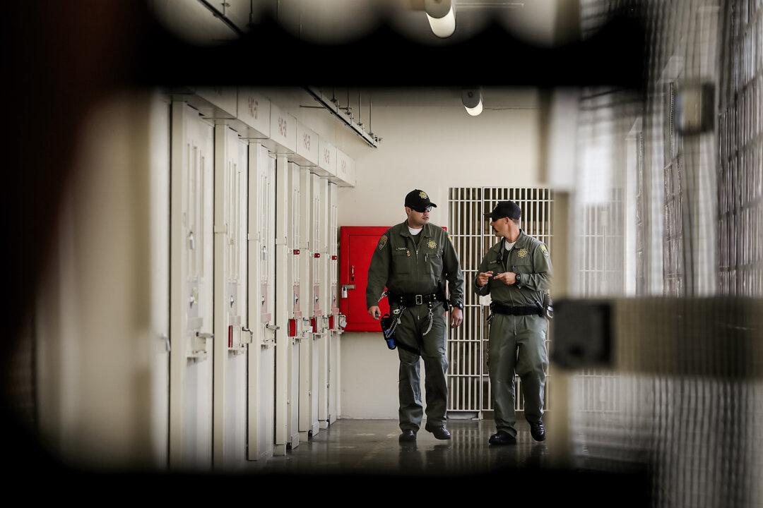 California Department of Corrections and Rehabilitation officers patrol San Quentin State Prison's death row in San Quentin, Calif., on Aug. 15, 2016. (Justin Sullivan/Getty Images)