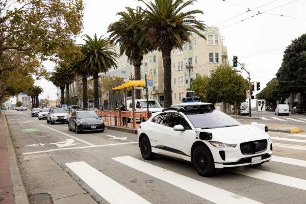 A Waymo autonomous vehicle on Market Street in San Francisco on Nov. 17, 2023. (Jason Henry/AFP via Getty Images)