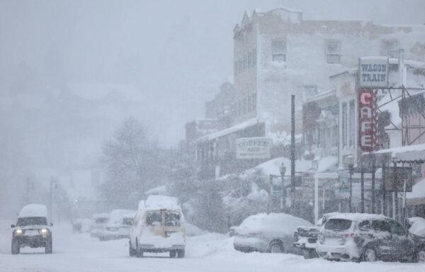 Snow falls downtown, north of Lake Tahoe, during a powerful multiple day winter storm in the Sierra Nevada mountains in Truckee, Calif., on March 2, 2024. (Mario Tama/Getty Images)