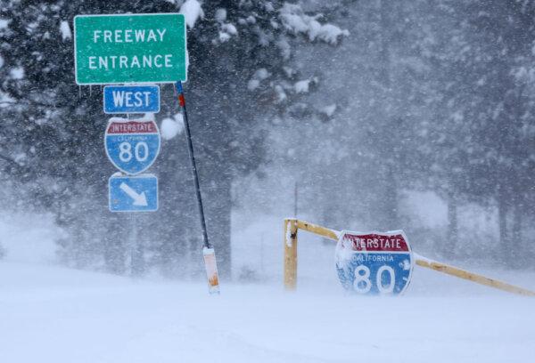 An Interstate 80 (I-80) entrance is covered in snow during a powerful multiple day winter storm in the Sierra Nevada mountains in Truckee, Calif., on March 3, 2024. (Mario Tama/Getty Images)