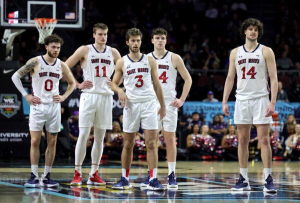 The Saint Mary's Gaels stand on the court during a semifinal game of the West Coast Conference basketball tournament at the Orleans Arena in Las Vegas, Nevada, on March 6, 2023. (Ethan Miller/Getty Images)