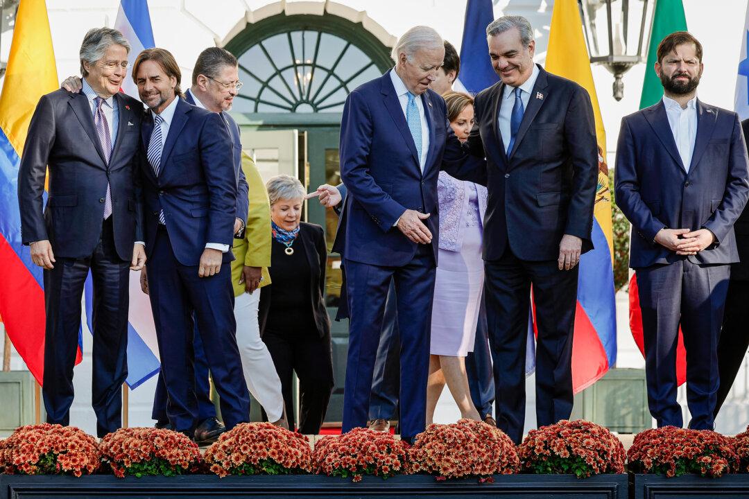 Ecuadoran President Guillermo Lasso, Uruguayan President Luis Lacalle Pou, Costa Rican President Rodrigo Chaves Robles, U.S. President Joe Biden, Dominican President Luis Abinader, Chilean President Gabriel Boric, and other leaders prepare to pose for a photograph during a summit at the White House in Washington on Nov. 3, 2023. (Chip Somodevilla/Getty Images)