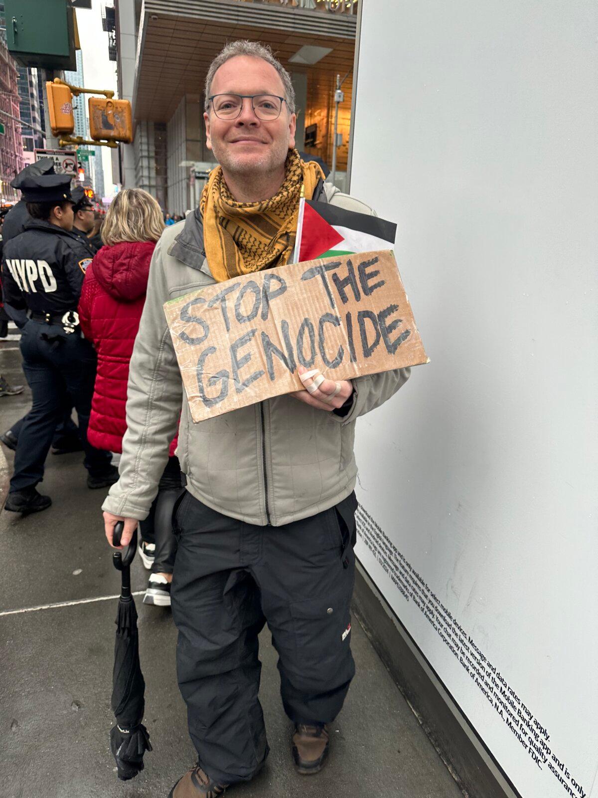 Jesse Pape attends the "Abandon Biden" rally in front of the Radio City Music Hall in New York on March 28, 2024. (Juliette Fairley/The Epoch Times)