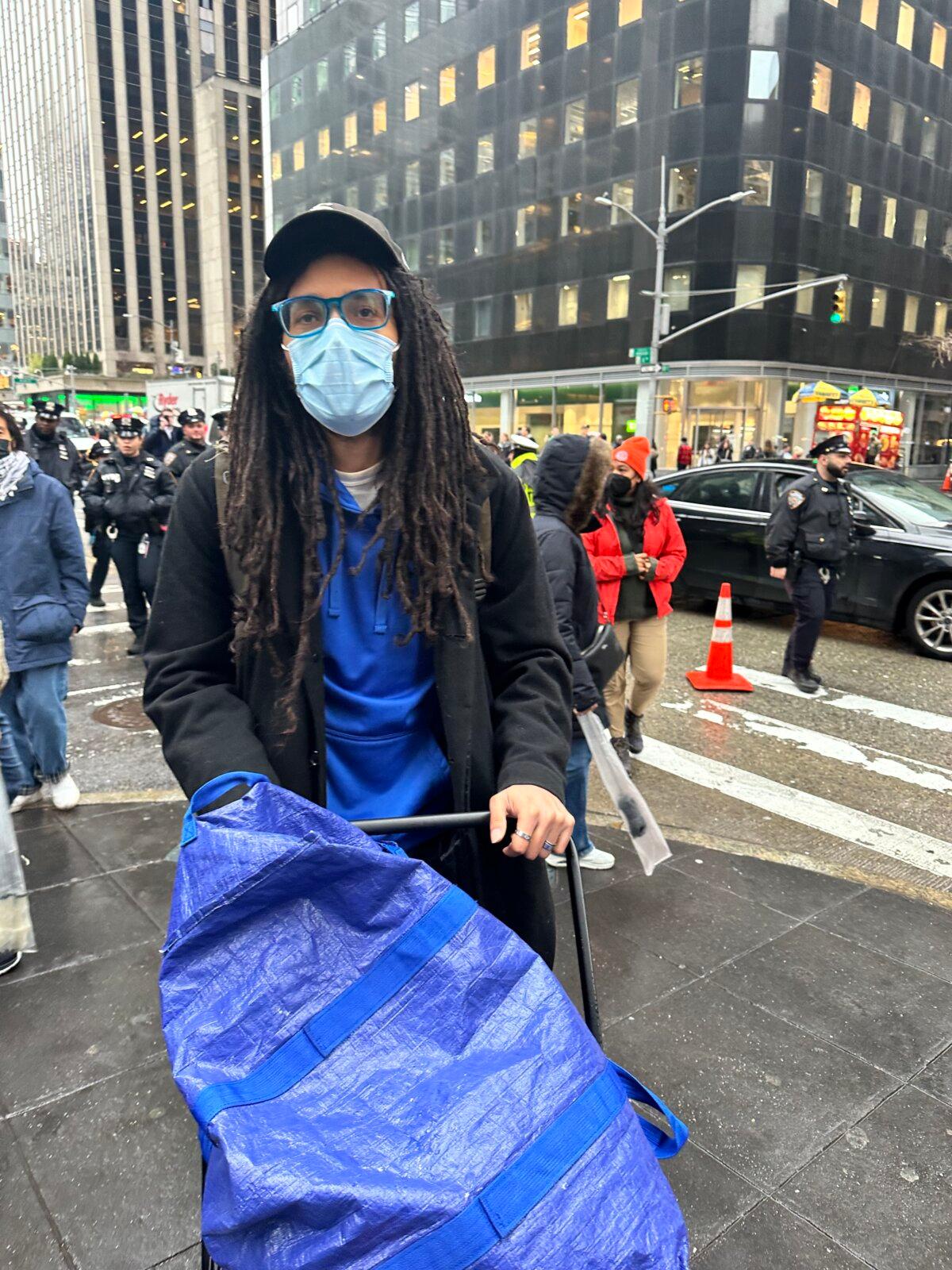 Travis Essof at the "Abandon Biden" rally in front of Radio City Music Hall in New York on March 28, 2024. (Juliette Fairley/The Epoch Times)