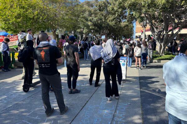 About 100 pro-Palestinian protestors gather at the University of California–Irvine in Irvine, Calif., on April 29, 2024. (Rudy Blalock/The Epoch Times)