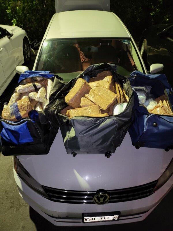 Seized fentanyl pills in three duffle bags. (U.S. Attorney's Office)