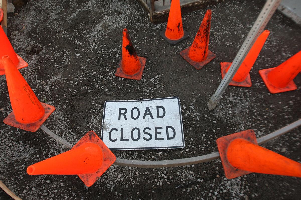 Cones cover the site of a public sidewalk repair project in Los Angeles, in a file photo. (David McNew/Getty Images)