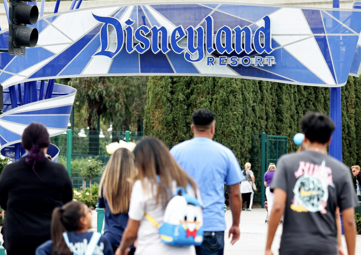 People enter Disneyland in Anaheim, Calif., on April 24, 2023. (Mario Tama/Getty Images)