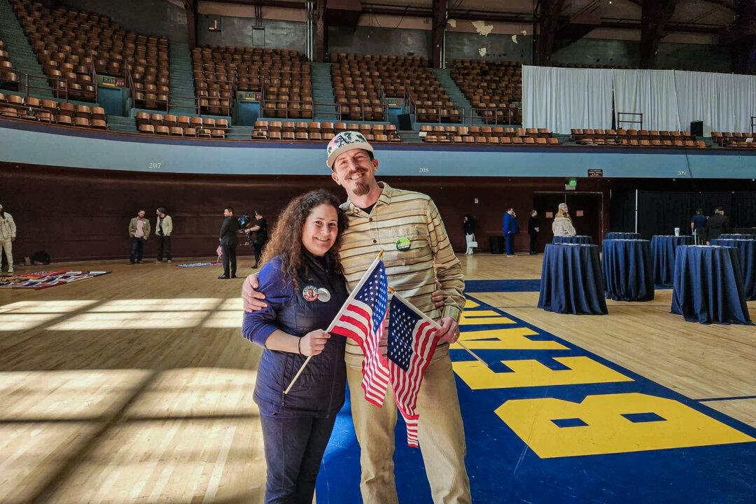 Joseph and Katie Sokolski-Spear after Robert F. Kennedy Jr.'s announcement to select Nicole Shanahan as his running mate on March 26 in Oakland, Calif. (Jeff Louderback/The Epoch Times)