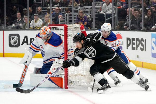 Kings winger Viktor Arvidsson is unable to put a puck past Oilers goaltender Stuart Skinner during a Stanley Cup playoff game in Los Angeles on April 28, 2024. (Mark J. Terrill/AP Photo)