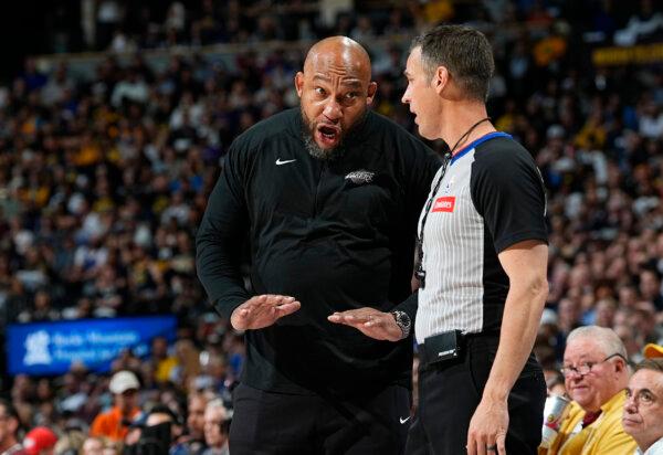 Lakers Coach Darvin Ham argues for a call with referee Kevin Scott during Game 5 against the Nuggets in Denver on April 29, 2024. (David Zalubowski/AP Photo)