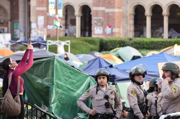 Los Angeles County Sheriff’s deputies keep watch near a pro-Palestinian encampment, the morning after it was attacked by counter-protestors at the University of California, Los Angeles campus, on May 1, 2024. (Mario Tama/Getty Images)
