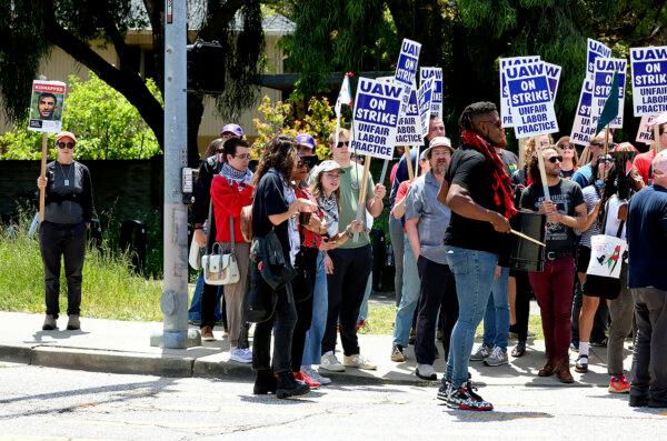 UC-Santa Cruz graduate students and other academic workers in the UAW 4811 union begin a strike at the main entrance to campus, in Santa Cruz, Calif. on May 20, 2024. (Shmuel Thaler/The Santa Cruz Sentinel via AP)