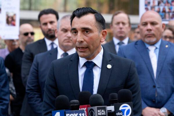 United States Attorney Martin Estrada joined by law enforcement officials and victim's family talks to the media in front of the U.S. Federal Building in downtown Los Angeles on May 2, 2024. (Richard Vogel/AP Photo)