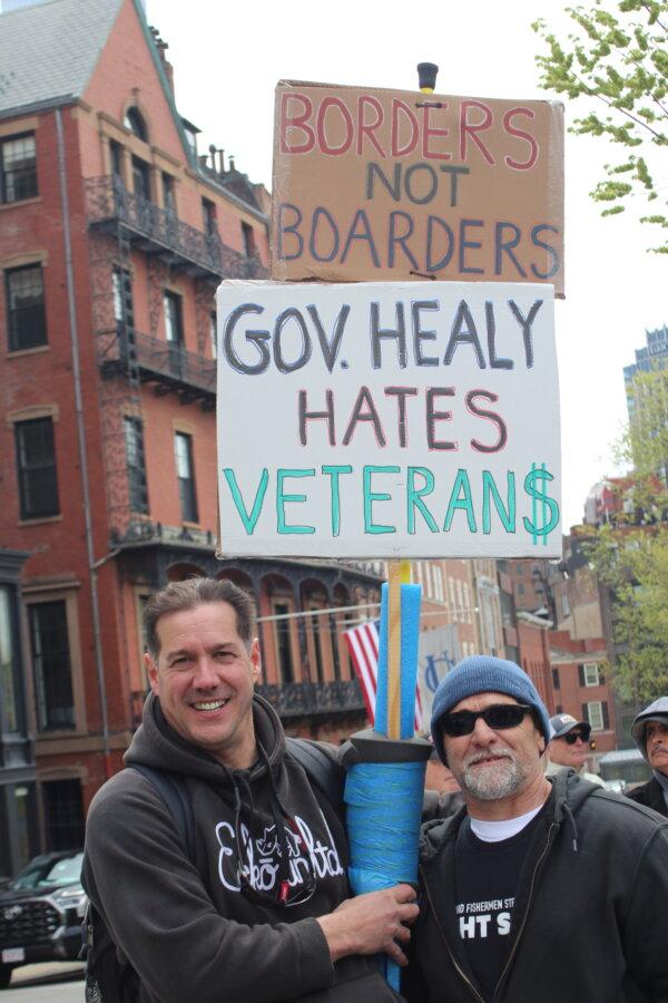 Fred Hurlburt (L) of Newbury, Mass., and Joe Sanfilippo of Gloucester, Mass., were among hundreds who attended a May 4, 2024, rally organized after Democrats shot down a bill that would have given U.S. veterans priority over immigrants at state-run shelters. (Alice Giordano/The Epoch Times)