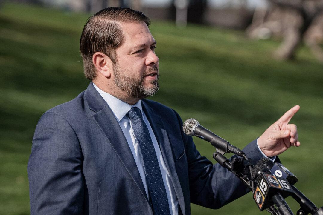 (Left) Rep. Ruben Gallego (D-Ariz.) holds a press conference in Tempe, Ariz., on March 14, 2023. (Right) Kari Lake, Republican candidate for U.S. Senate, arrives at the Trump caucus night party in Des Moines, Iowa, on Jan. 15, 2024. (Rebecca Noble/AFP via Getty Images, Alex Wong/Getty Images)