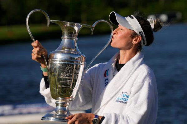 Nelly Korda kisses the trophy after winning the Chevron Championship LPGA golf tournament in The Woodlands, Texas, on April 21, 2024. (David J. Phillip/AP Photo)