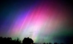 Solar Storm Hits Earth, Producing Colorful Light Shows Across Northern Hemisphere