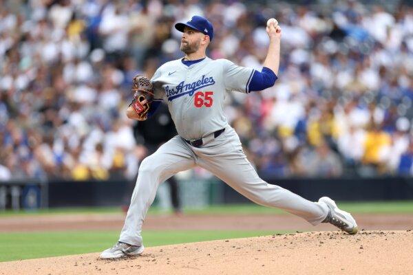 James Paxton (65) of the Los Angeles Dodgers pitches during the first inning of a game against the San Diego Padres in San Diego on May 11, 2024. (Sean M. Haffey/Getty Images)