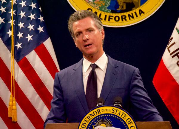 Gov. Gavin Newsom announces billions of dollars in spending cuts during his May budget revision news conference at the state Capitol on May 10. (Travis Gillmore/The Epoch Times)