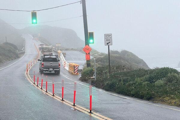 A section of Highway 1 reopens after storm damage was repaired in Big Sur, Calif., on May 17. (Kevin Drabinski/California Department of Transportation via AP)