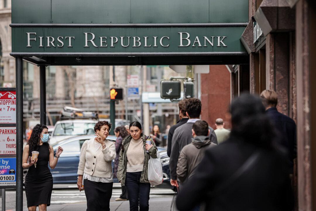 People walk by the First Republic Bank headquarters in San Francisco on March 13, 2023. (Justin Sullivan/Getty Images)