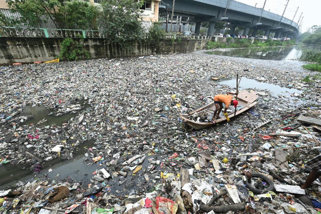 Plastic pollution comes in all forms, from packaging and waste that clogs the Buckingham Canal in Chennai, India to plastic pellets from petrochemical companies that litter the ground in Ecaussinnes, Belgium. (R. SATISH BABU, Kenzo TRIBOUILLARD / AFP via Getty Images)