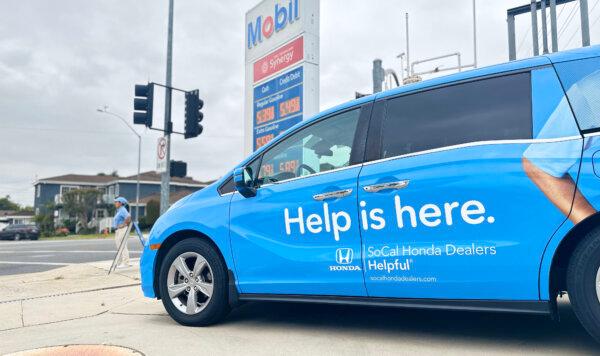 Honda promotes its giveaway in Burbank, Calif., on May 23, 2024. (Jill McLaughlin/The Epoch Times)