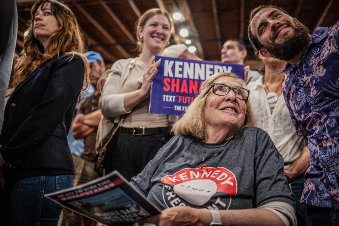 Supporters take a selfie together during a rally for independent presidential candidate Robert F. Kennedy Jr. in Austin, Texas on May 13, 2024. (Sergio Flores/AFP via Getty Images)