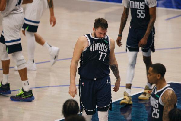 Mavericks star Luka Doncic walks off the court after his team fell to the Timberwolves in Game 4 of the NBA Western Conference finals in Dallas on May 28, 2024. (Gareth Patterson/AP Photo)