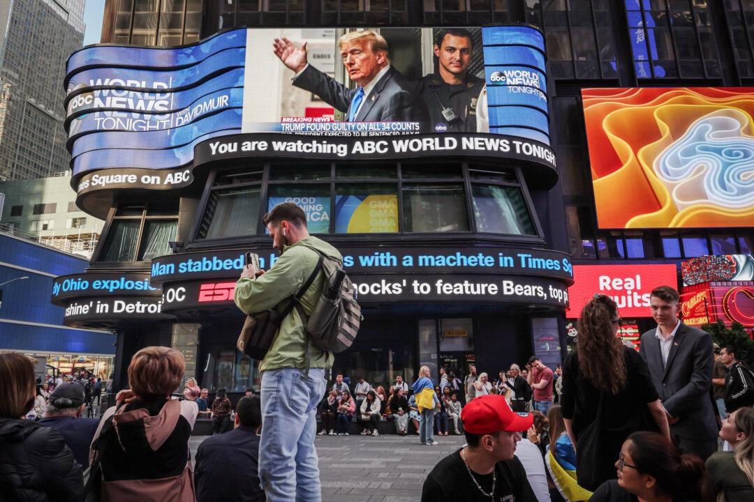 Screens display news of former President Donald Trump's conviction, in New York City's Times Square on May 30, 202. (Michael M. Santiago/Getty Images)