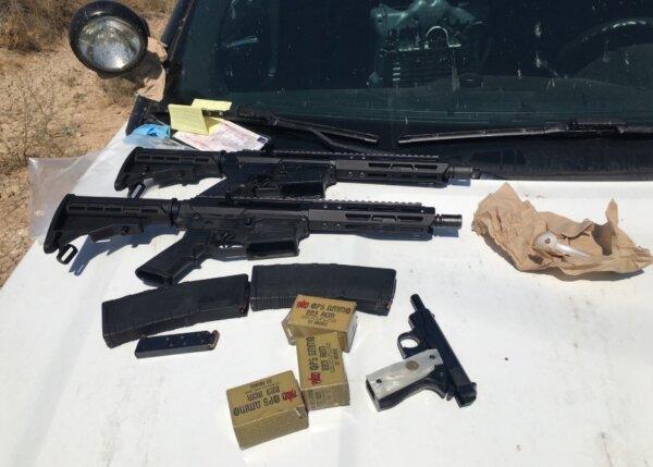 Two AR-style rifles, a pistol, magazines, and Russian-made ammunition. All were exchanged for drugs, prosecutors said. (U.S. Department of Justice)