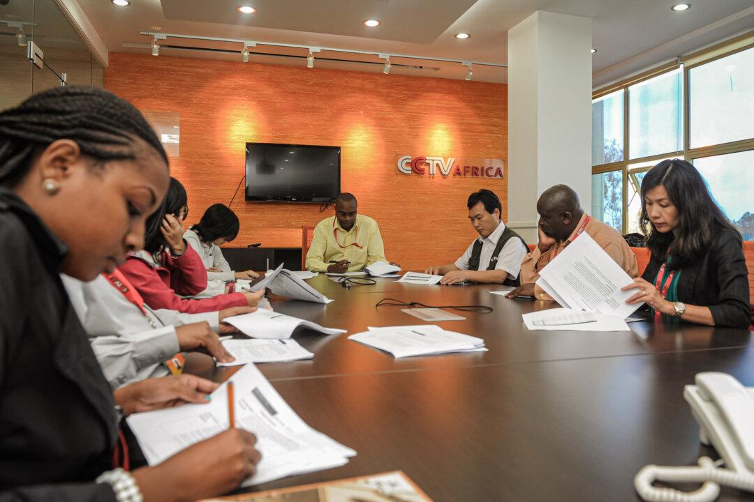 China Central Television (CCTV) Africa's journalists attend an editorial meeting in the premises of the television in Nairobi, Kenya, on June 12, 2012. (Simon Maina/AFP/GettyImages)