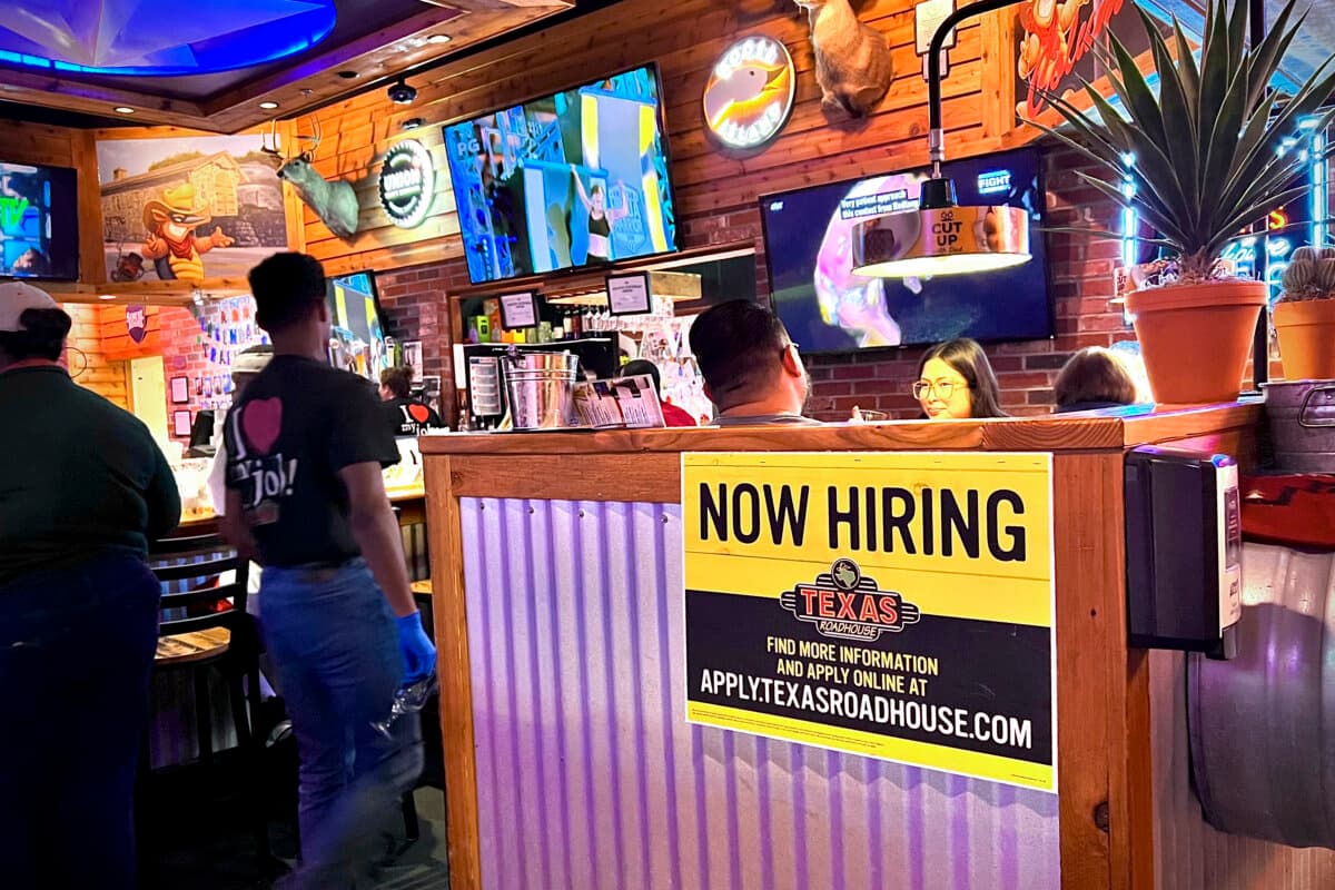 A hiring sign at a restaurant in Columbia, Md., on June 15, 2024. (Madalina Vasiliu/The Epoch Times)