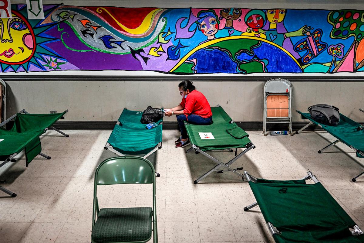 An illegal immigrant sits at a shelter in San Antonio on June 29, 2022. (Chandan Khanna/AFP via Getty Images)