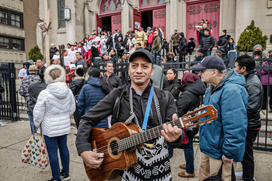 Church members gather on Good Friday in the Brooklyn borough of New York City on April 7, 2023. Most religious Latinos are Catholic. (Spencer Platt/Getty Images)