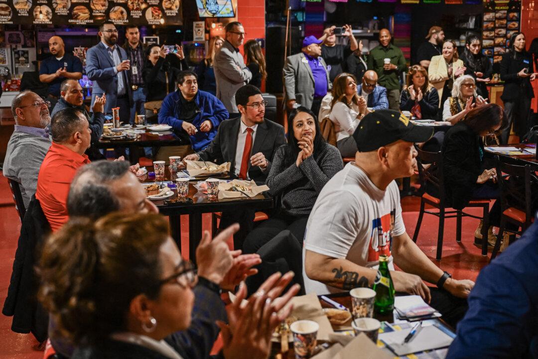 Attendees listen to local political candidates speak during a small business breakfast event with the Latin Chamber of Commerce, in Las Vegas on Feb. 2, 2024. Around one-third of Nevada's population is Latino. (Patrick T. Fallon/AFP via Getty Images)