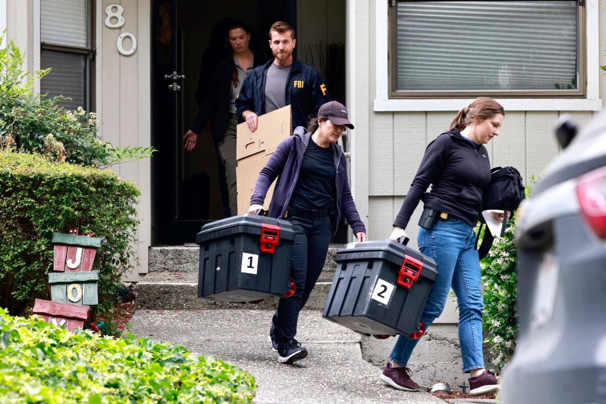 FBI agents raid a home on Maiden Lane where Oakland Mayor Sheng Thao allegedly lives in Oakland, Calif., on June 20, 2024. (Jessica Christian/San Francisco Chronicle via AP)