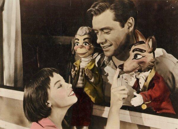 A cropped lobby card of Leslie Caron as Lili Daurier and Mel Ferrer as Paul Berthalet in the 1953 film "Lili." (MovieStillsDB)